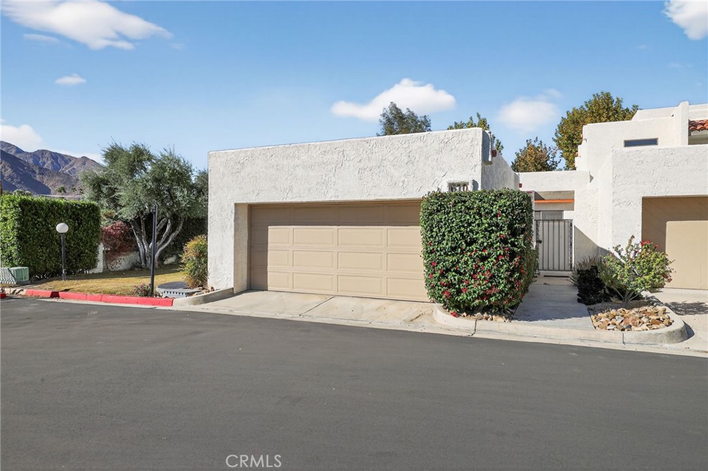 610 Violeta Drive Palm Springs, CA 92262 - Photo 23 of 25 front view of a house with a yard
