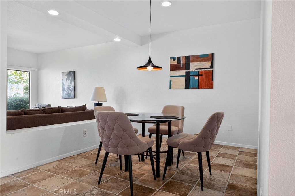 610 Violeta Drive Palm Springs, CA 92262 - Photo 8 of 25 a dining room with furniture and window