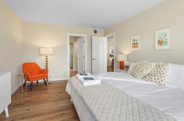 a view of a living room and bathroom