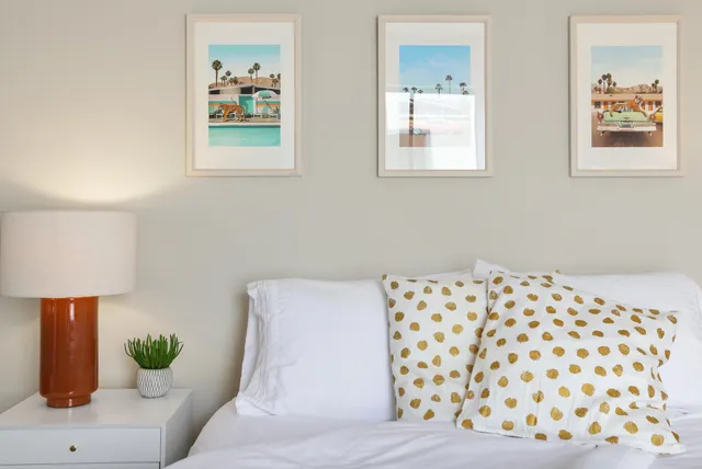 a backyard of a house with a garden and plants