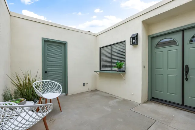 a view of a hallway with windows