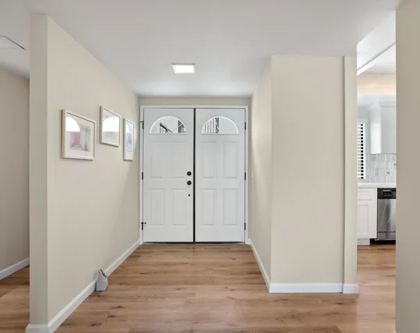 a view of a hallway with closet