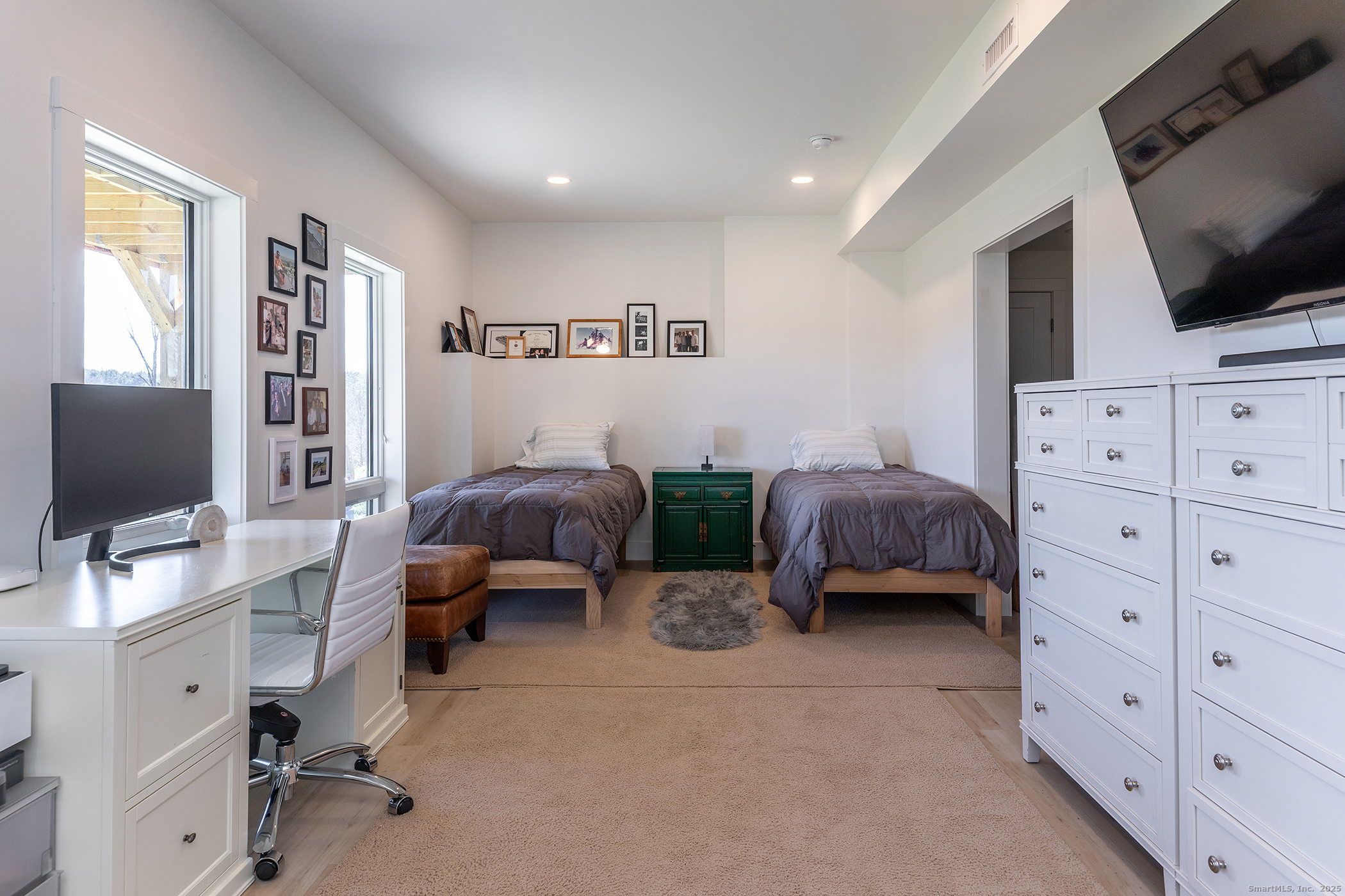 202 Sharon Valley Road Sharon, CT 06069 - Photo 16 of 19 a living room with furniture and a flat screen tv