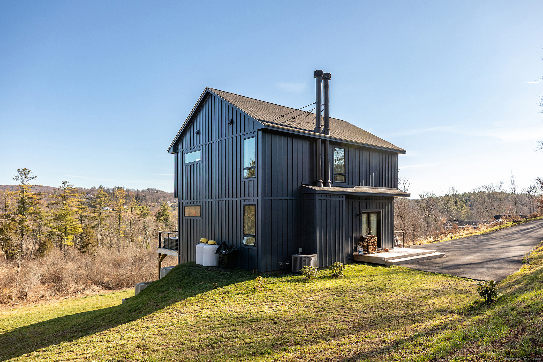202 Sharon Valley Road Sharon, CT 06069 - Photo 18 of 19 a view of a house with a swimming pool