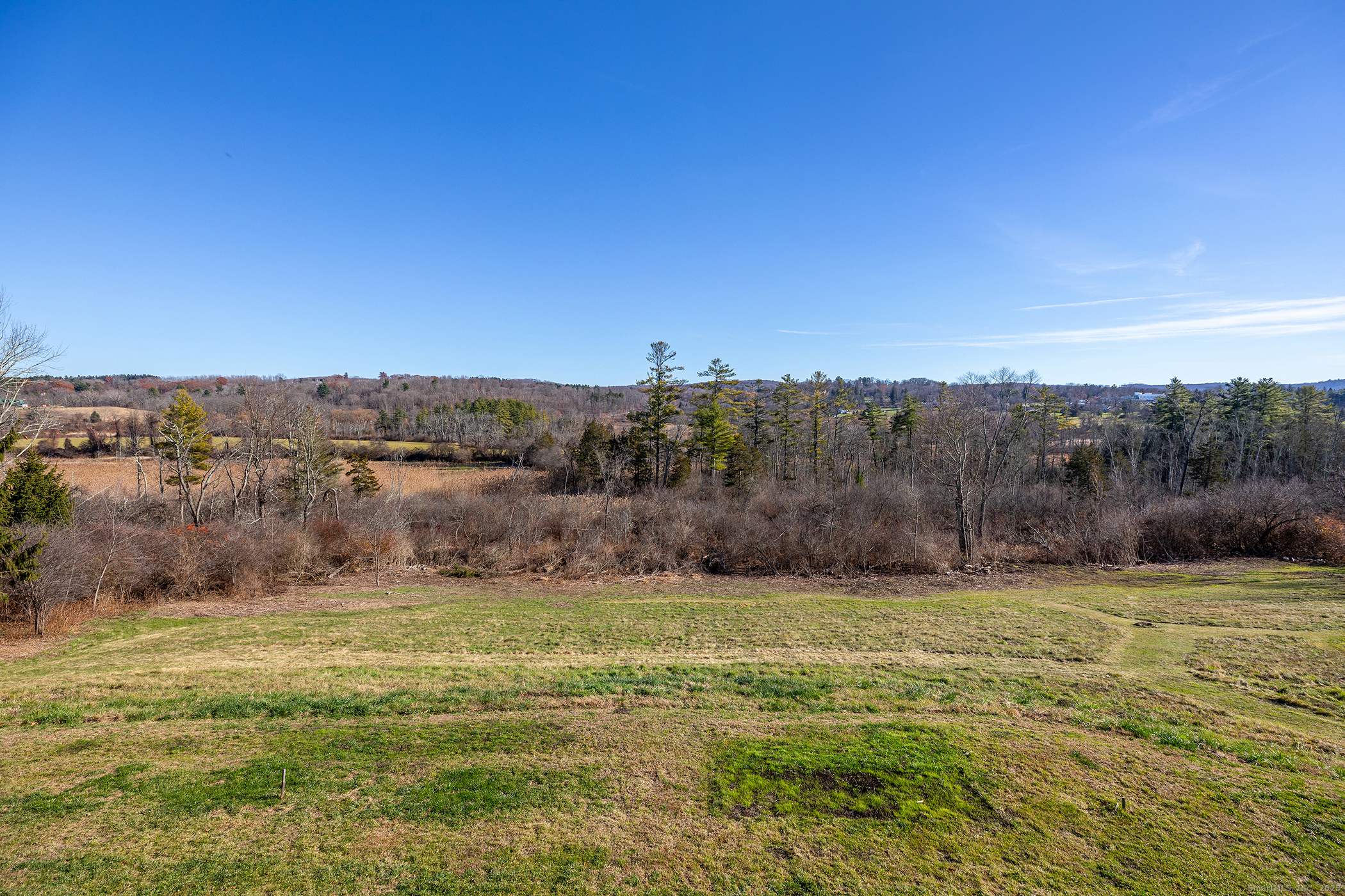 202 Sharon Valley Road Sharon, CT 06069 - Photo 2 of 19 a view of a field with an ocean