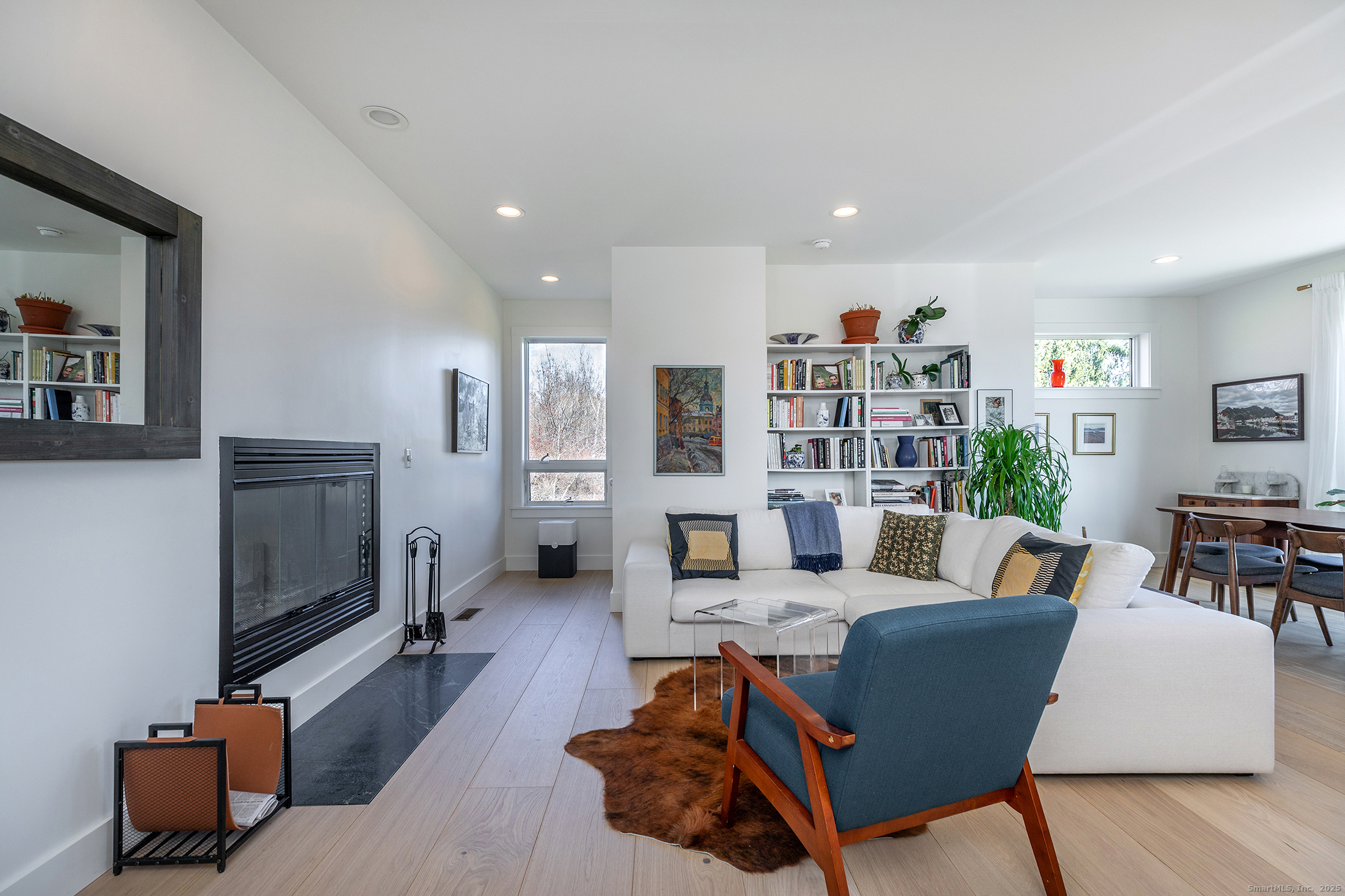 202 Sharon Valley Road Sharon, CT 06069 - Photo 5 of 19 a living room with furniture and a flat screen tv