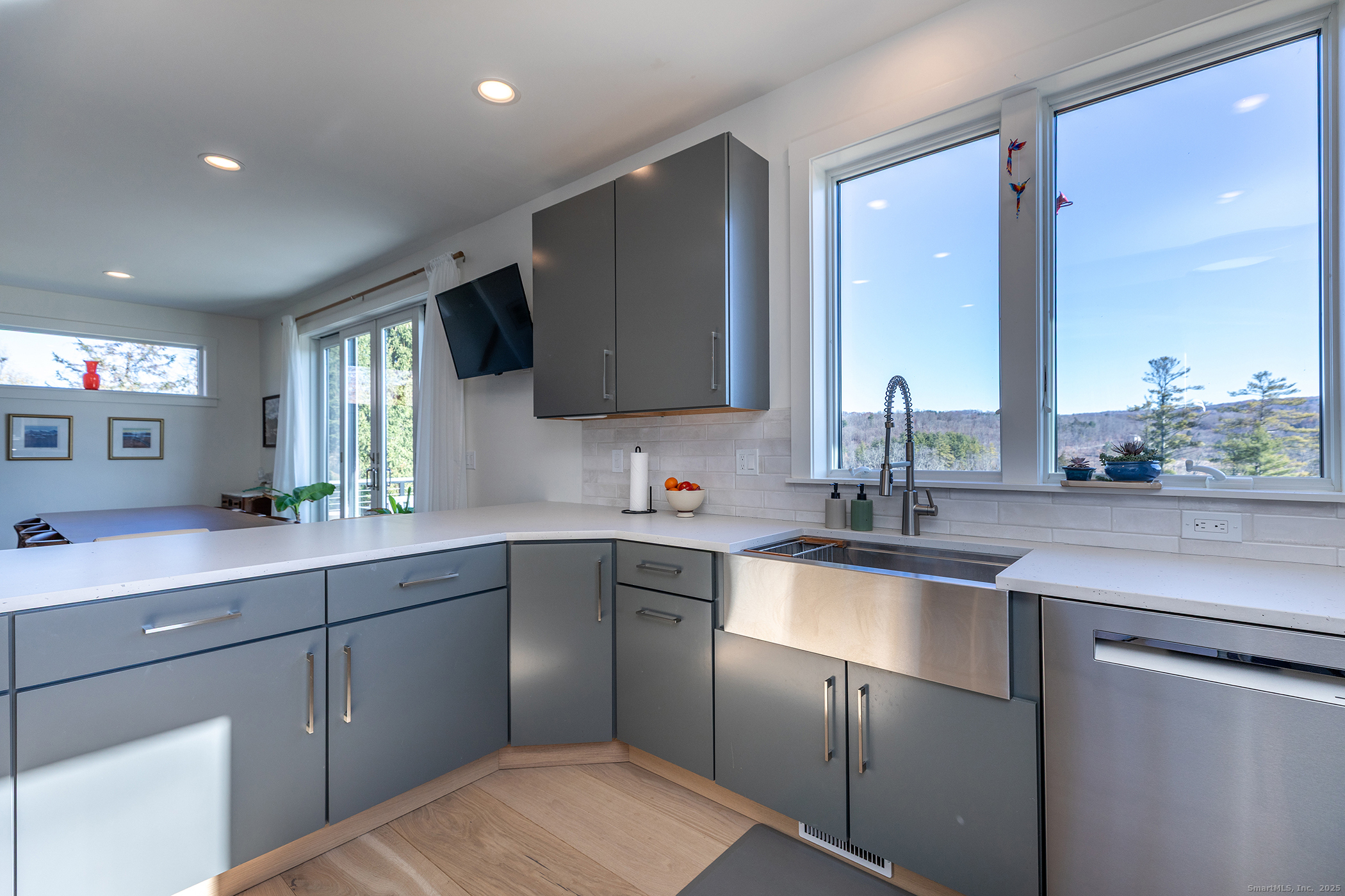 202 Sharon Valley Road Sharon, CT 06069 - Photo 9 of 19 a kitchen with a sink and cabinets