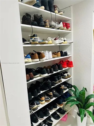 a room with lots of different colored cloths