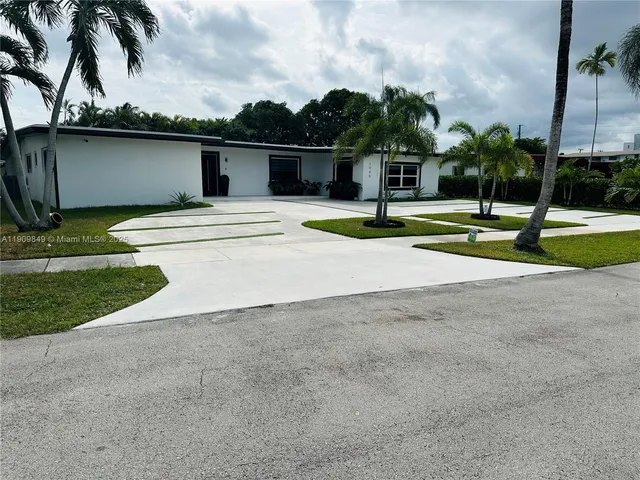 a view of a house with a swimming pool