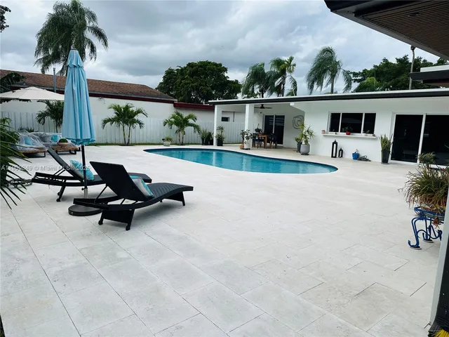 front view of a house with a patio