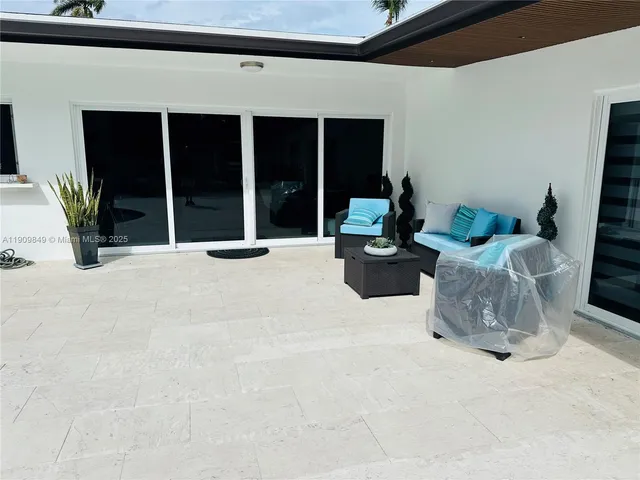 a view of a porch with seating space