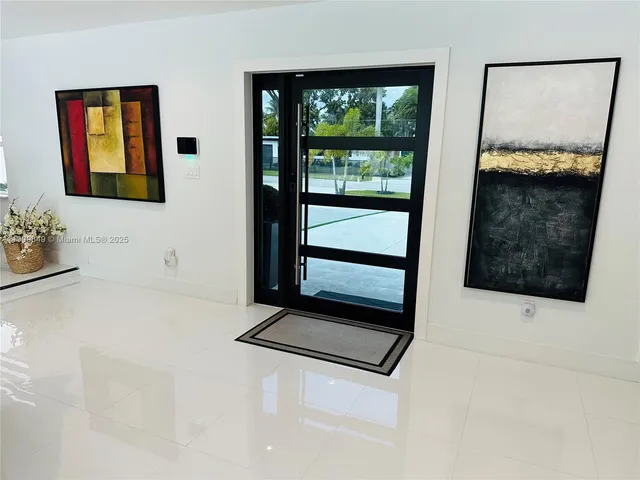 a bathroom with a tub and shower