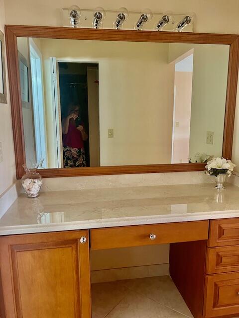 Undisclosed Address Boca Raton, FL 33487 - Photo 17 of 45 a bathroom with a sink and a mirror