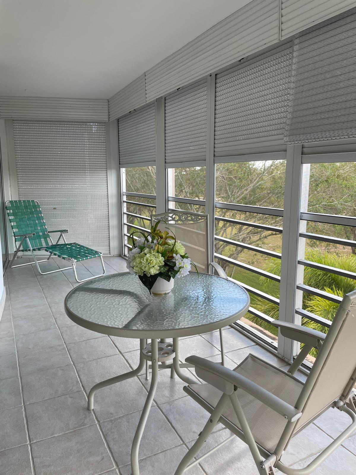 Undisclosed Address Boca Raton, FL 33487 - Photo 6 of 45 a dining room with furniture and a floor to ceiling window