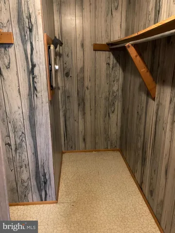a bathroom with a shower and a toilet