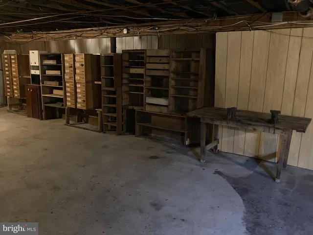 a room with a cabinet and couch