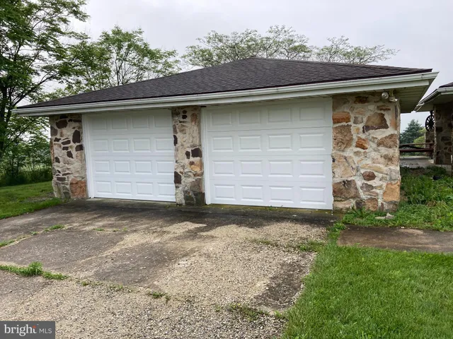 a garden view with a seating space