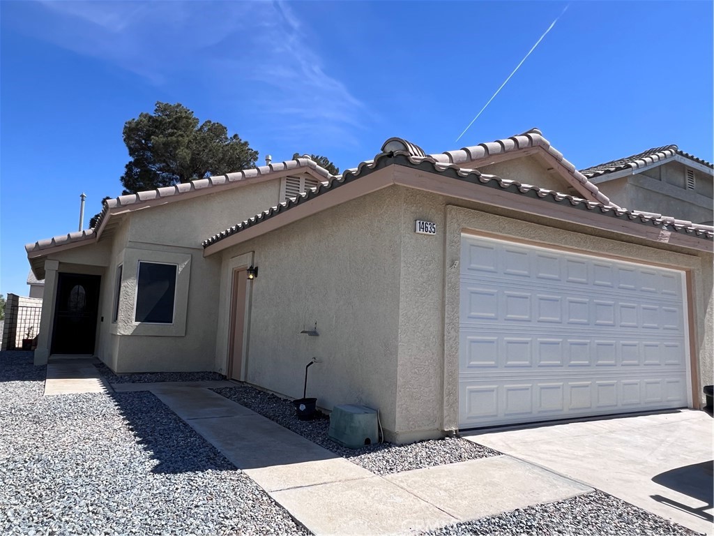14635 Foothill Road Victorville, CA 92394 - Photo 1 of 1 a view of a house with a small space