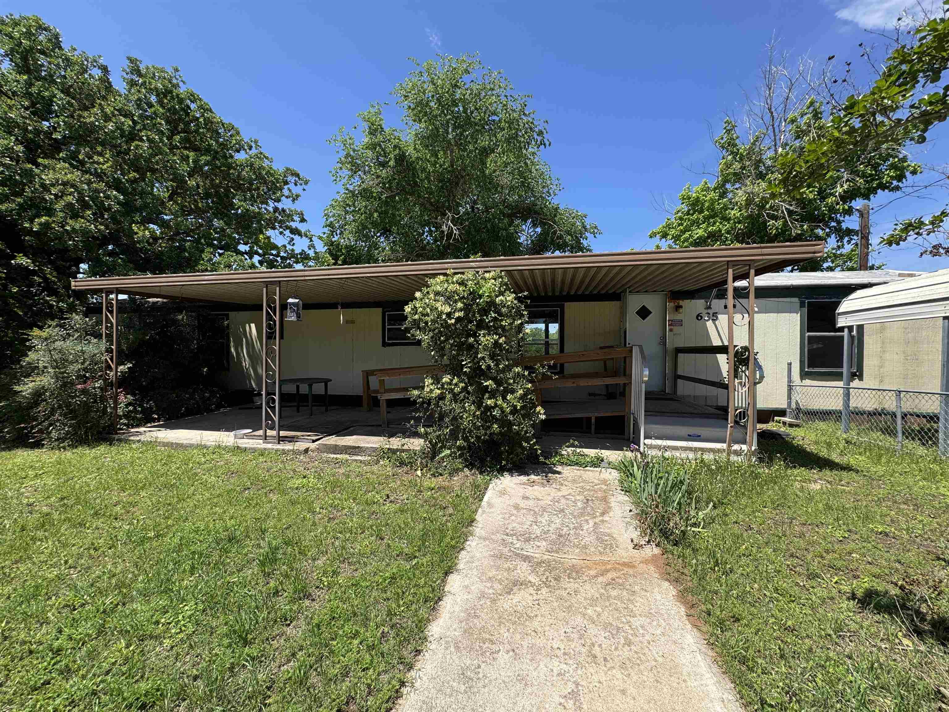 635 Village Loop Tow, TX 78672 - Photo 1 of 27 front view of a house with a yard