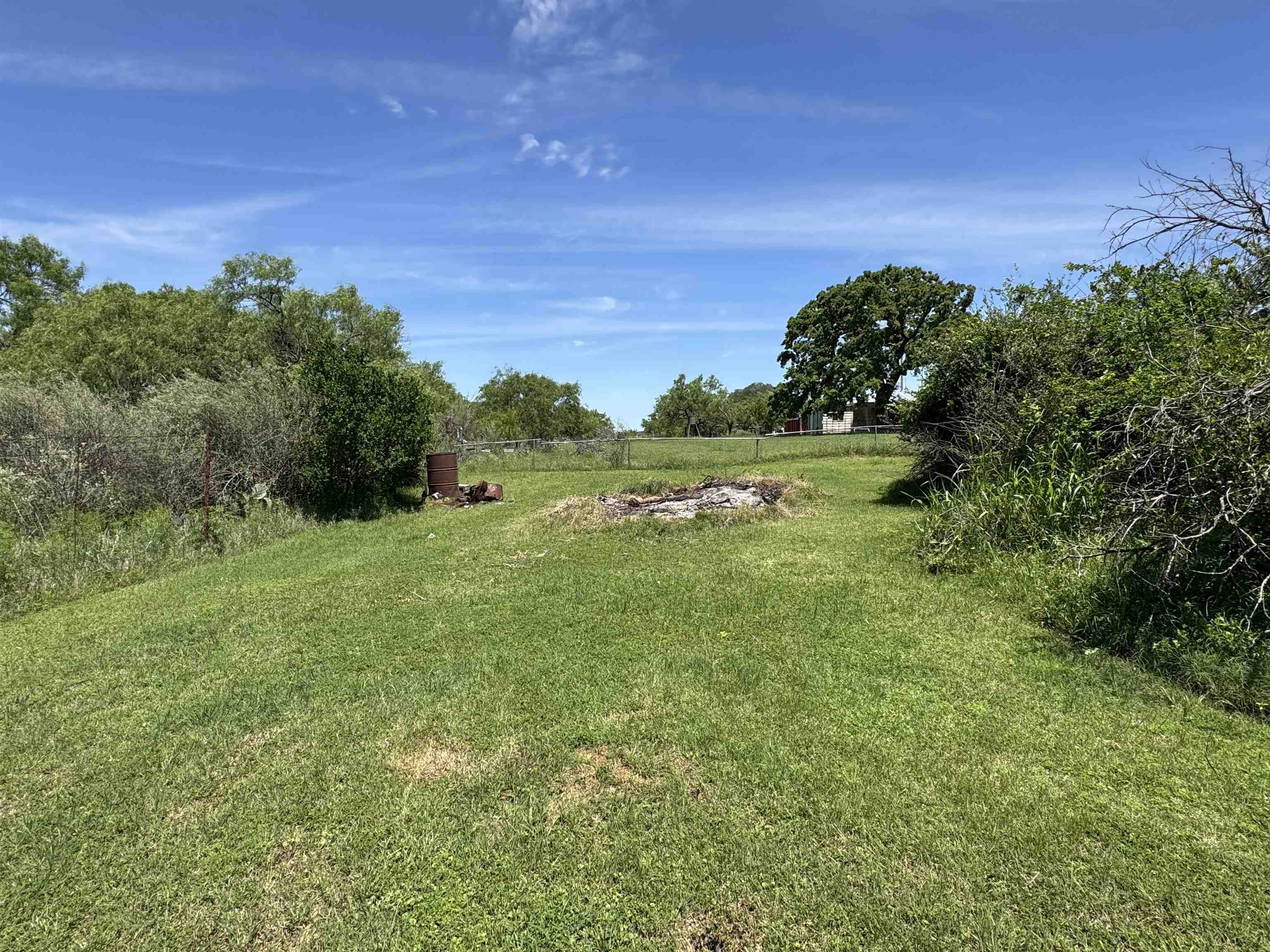 635 Village Loop Tow, TX 78672 - Photo 20 of 27 a view of a big yard with large trees