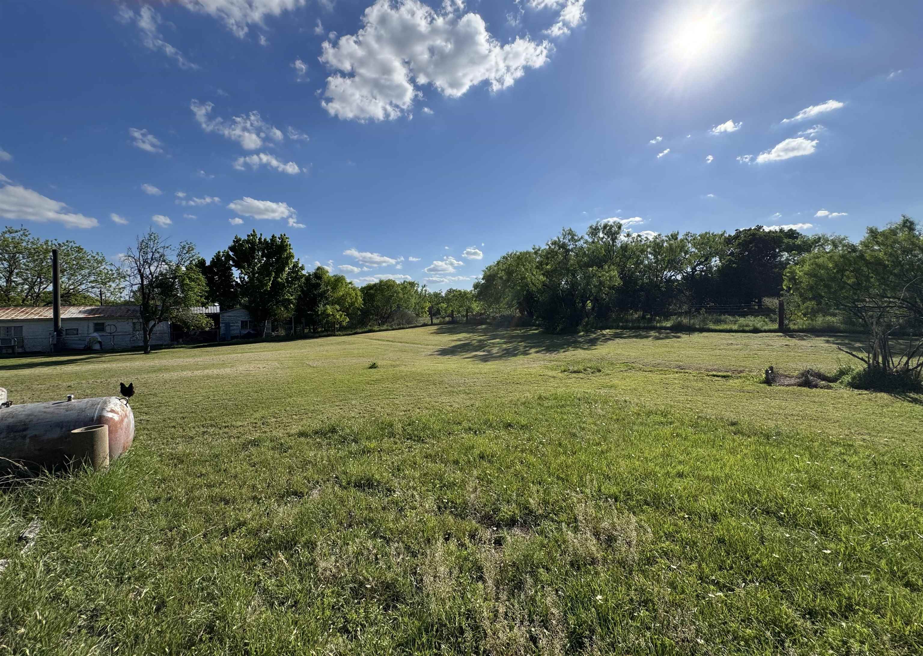 635 Village Loop Tow, TX 78672 - Photo 25 of 27 a view of a golf course with a lake