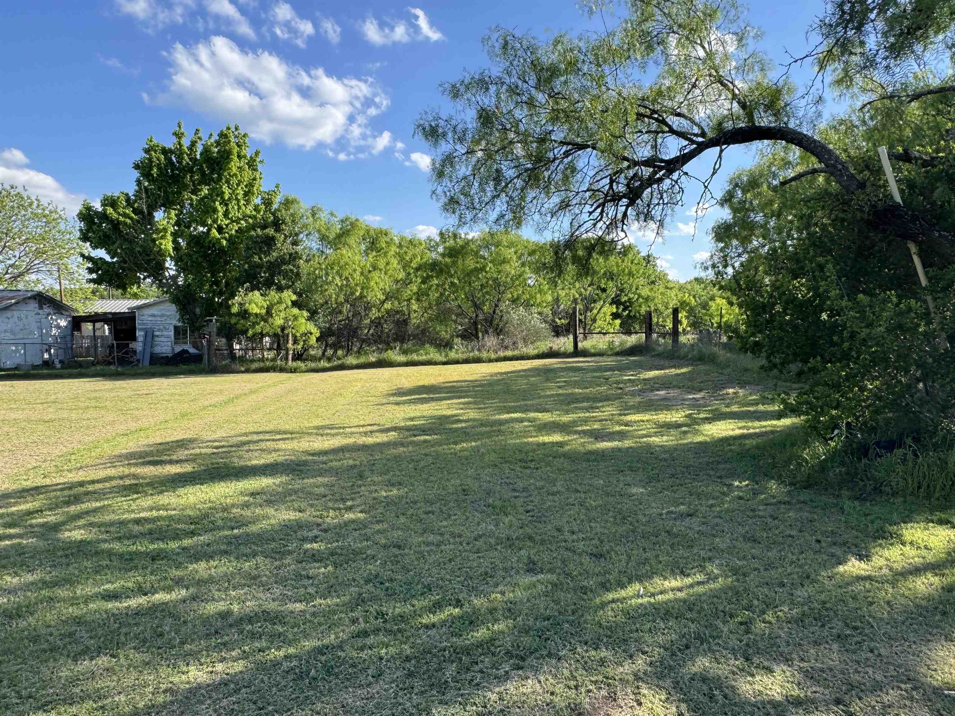 635 Village Loop Tow, TX 78672 - Photo 27 of 27 a view of a swimming pool with an outdoor space and seating area
