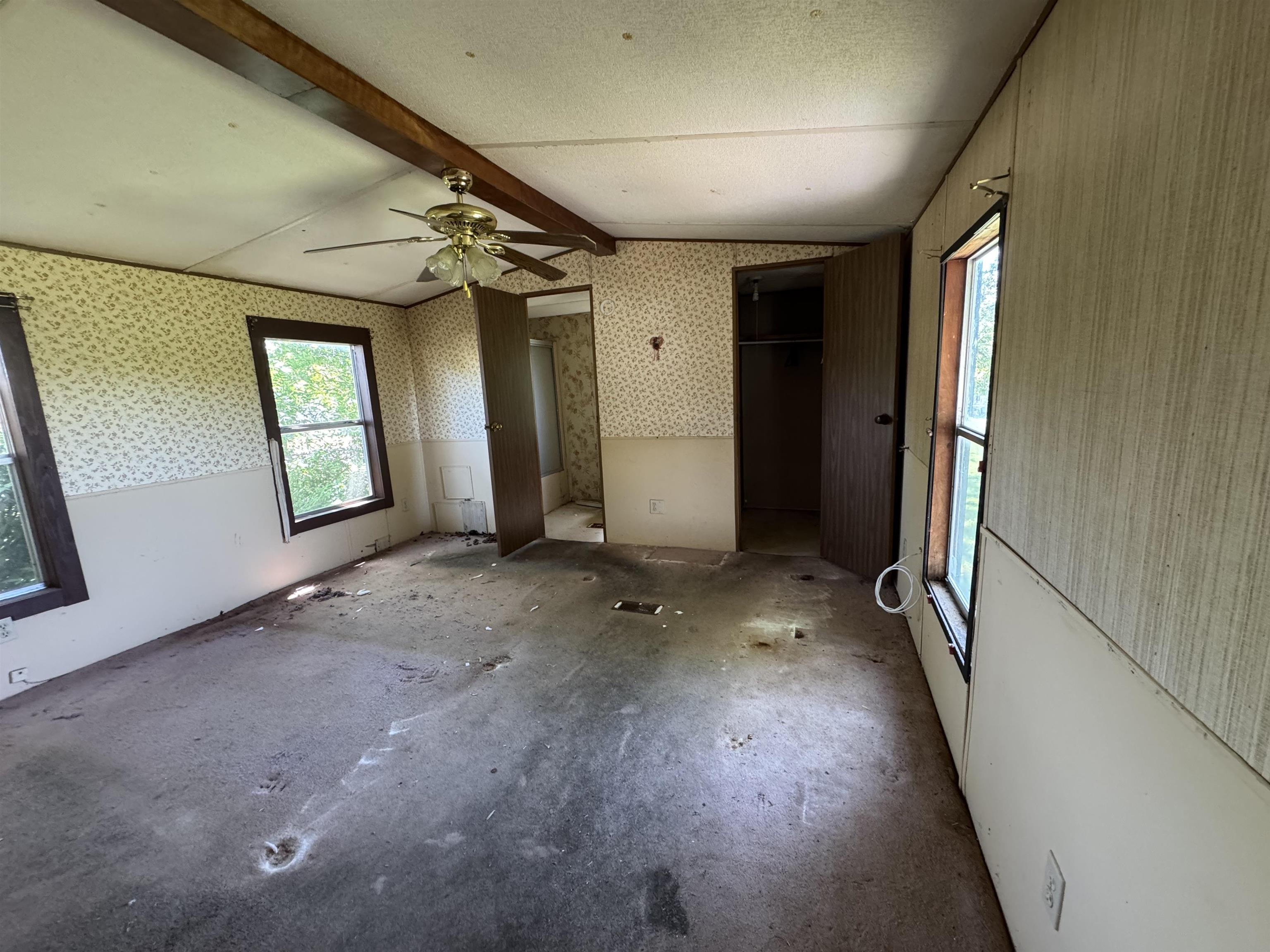 635 Village Loop Tow, TX 78672 - Photo 8 of 27 an empty room with windows