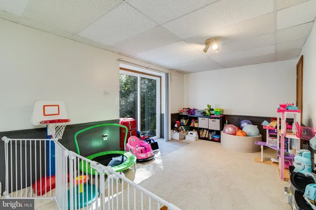 a view of a deck with wooden floor and furniture