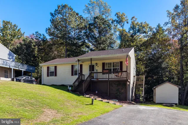 a porch with wooden floor