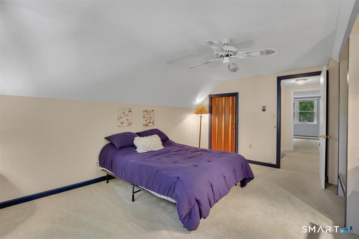 328 Bulkeley Hill Road Colchester, CT 06415 - Photo 20 of 40 Bedroom with wall to wall carpeting