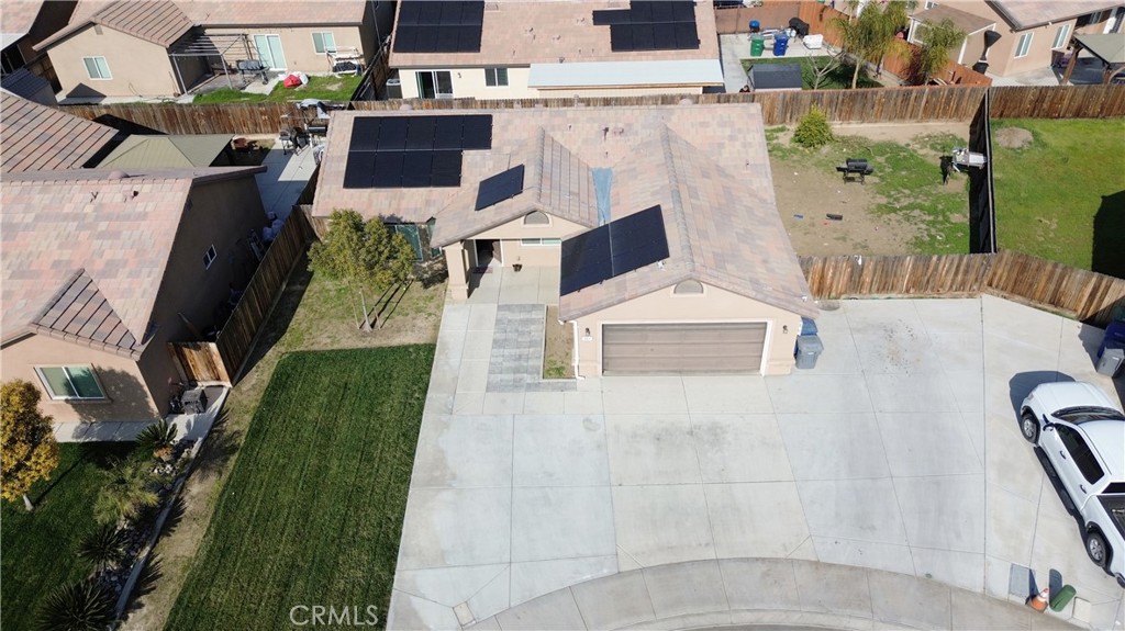 301 Moonstone Beach Court Delano, CA 93215 - Photo 28 of 31 an aerial view of a house with a yard