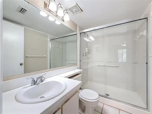 a view of a hallway with washer and dryer