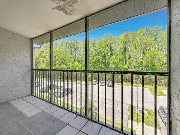 a view of a bathroom with a glass door