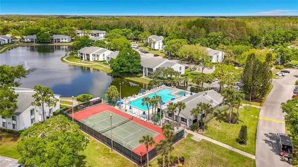 aerial view of a house with swimming pool and outdoor space