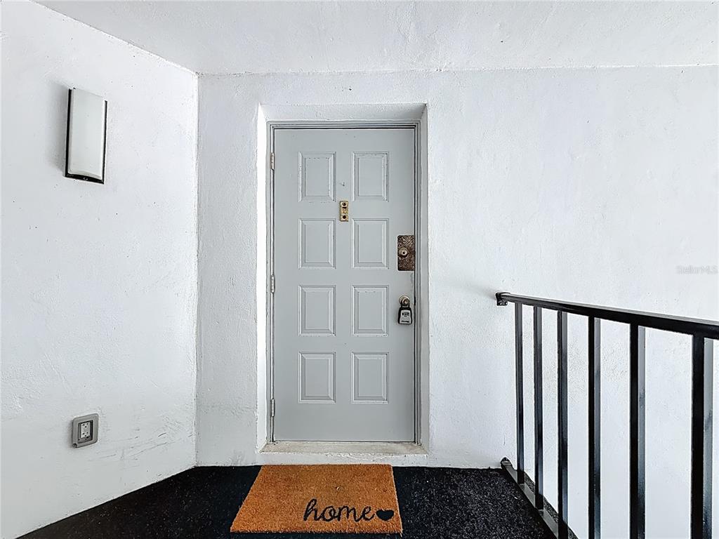 1372 Pine Ridge Circle East, Unit H3 Tarpon Springs, FL 34688 - Photo 5 of 53 a view of front door
