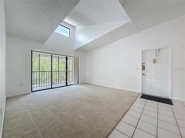 an empty room with a bathroom