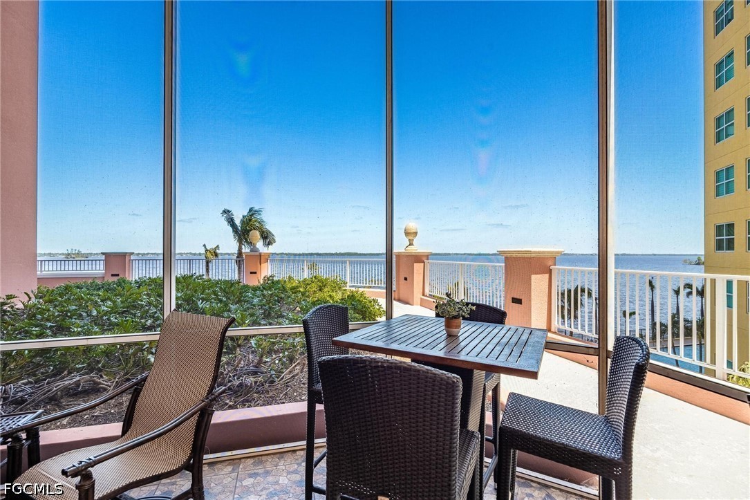 2745 First Street, Unit 306 Fort Myers, FL 33916 - Photo 29 of 50 a view of a balcony with chairs
