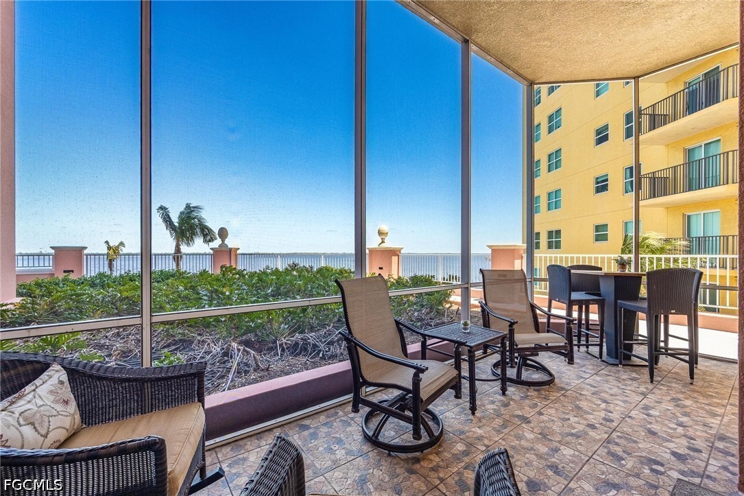 2745 First Street, Unit 306 Fort Myers, FL 33916 - Photo 30 of 50 a view of a terrace with furniture