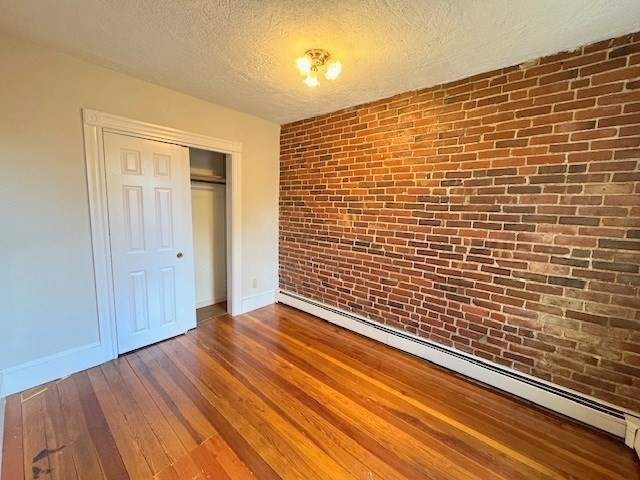 4 Mead Street, Unit 3 Boston, MA 02134 - Photo 12 of 20 a view of wooden floor