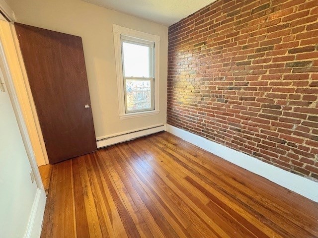 4 Mead Street, Unit 3 Boston, MA 02134 - Photo 18 of 20 a view of wooden floor in a room