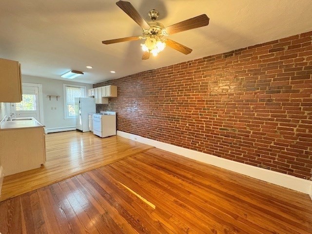 4 Mead Street, Unit 3 Boston, MA 02134 - Photo 3 of 20 a view of empty room with wooden floor