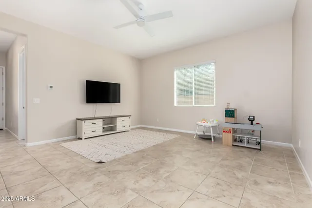 a kitchen with stainless steel appliances a stove and a microwave