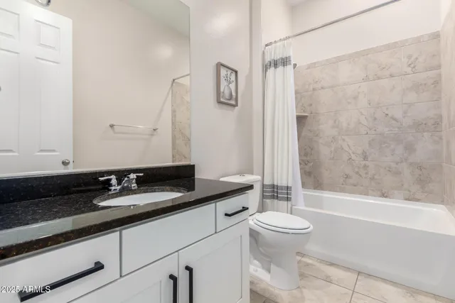 a view of livingroom with furniture and a window