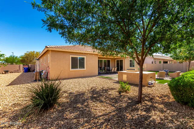 a view of a house with swimming pool