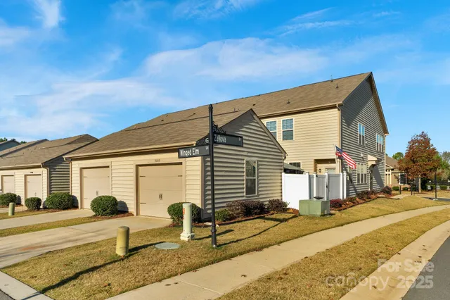 a view of a house with a street