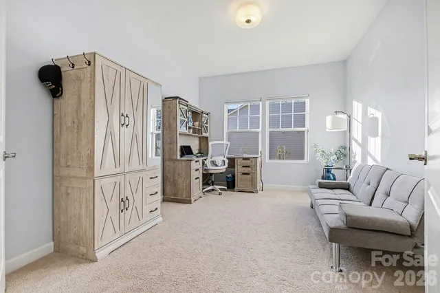 a view of a livingroom with furniture