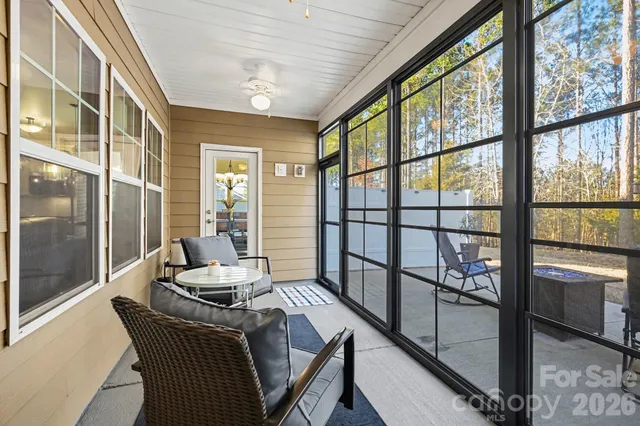 a backyard of a house with yard and seating space
