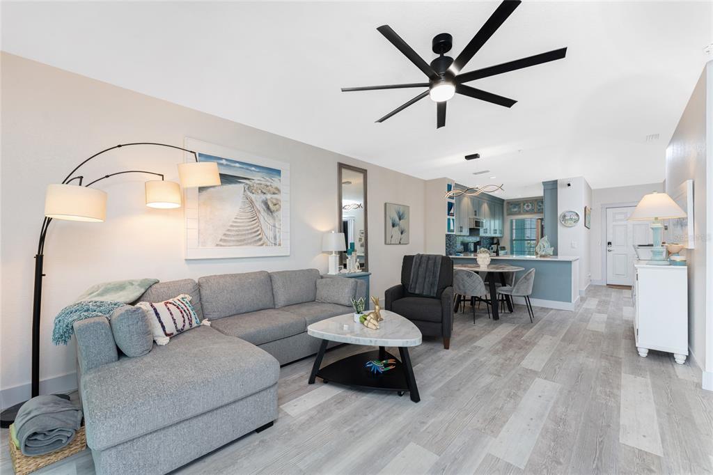 8405 Placida Road, Unit 406 Placida, FL 33946 - Photo 15 of 55 a living room with furniture and white walls