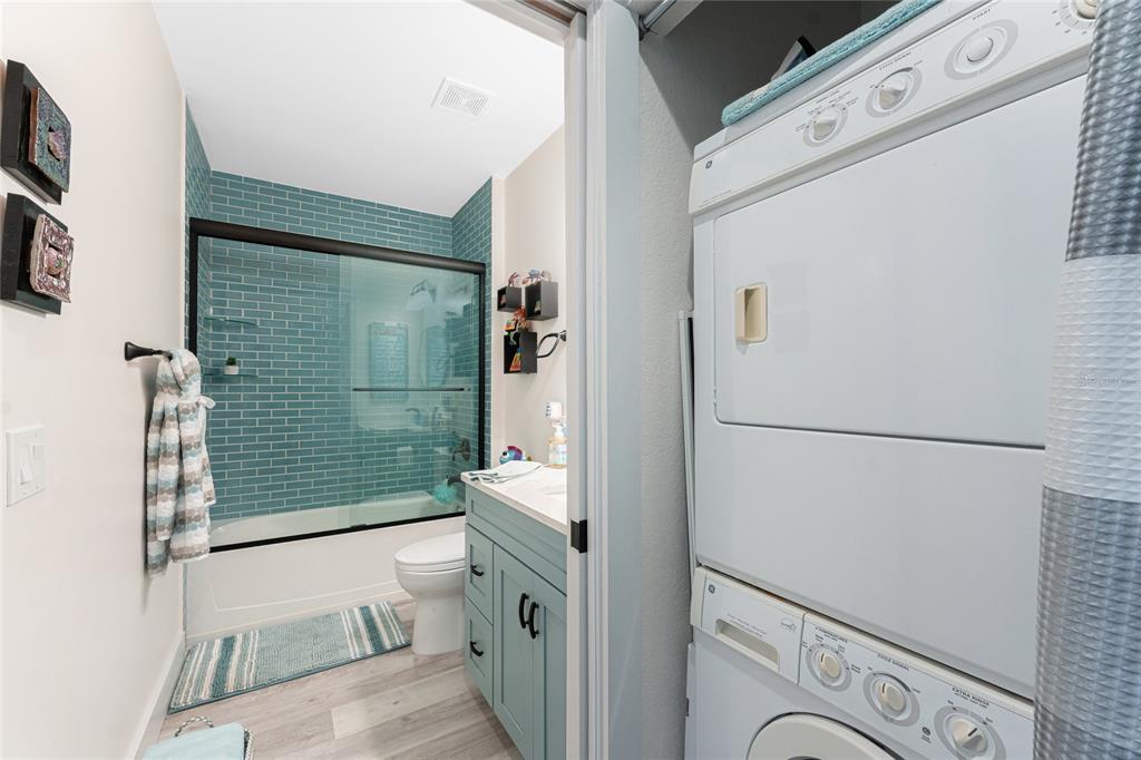 8405 Placida Road, Unit 406 Placida, FL 33946 - Photo 37 of 55 a bathroom with a sink toilet and shower