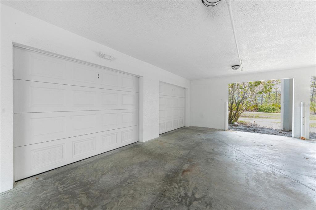 8405 Placida Road, Unit 406 Placida, FL 33946 - Photo 38 of 55 an empty room with windows